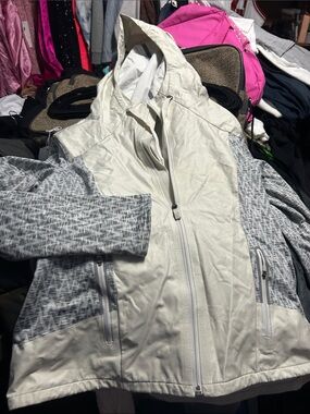 The North Face Women's White Hooded Ski Jacket with Gray Patterned Sleeves